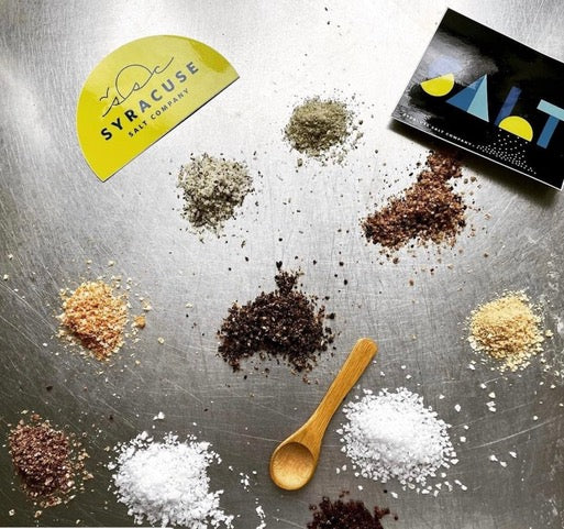 Four finishing salts on a board